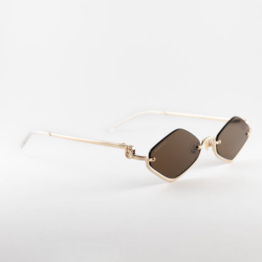 Occhiali da sole Gucci GG1604S 002 oro romboidali